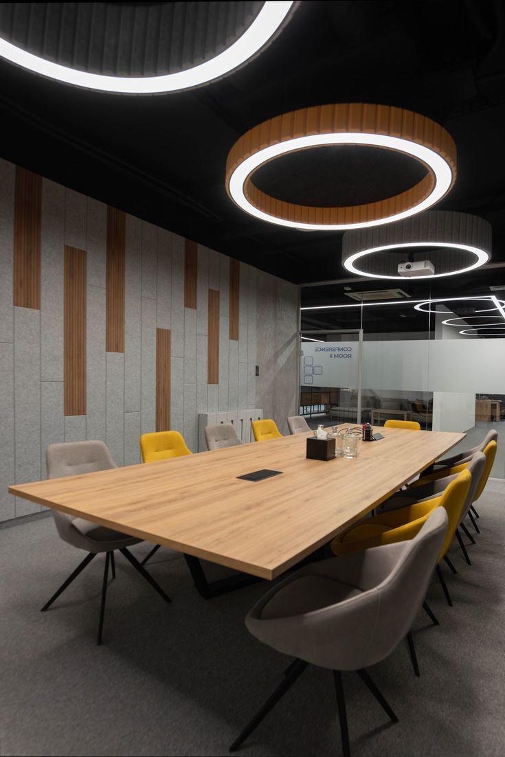 Acoustic lighting feature with bespoke ceiling treatment by Mistry Interiors